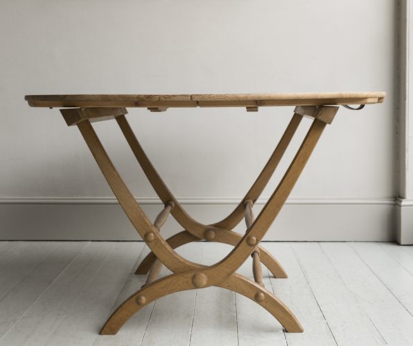 A hugely practical C19th-style folding table by HOWE London, perfect for seasonal outdoor use. Made with a Douglas fir top on oak legs. Also available to order in teak.