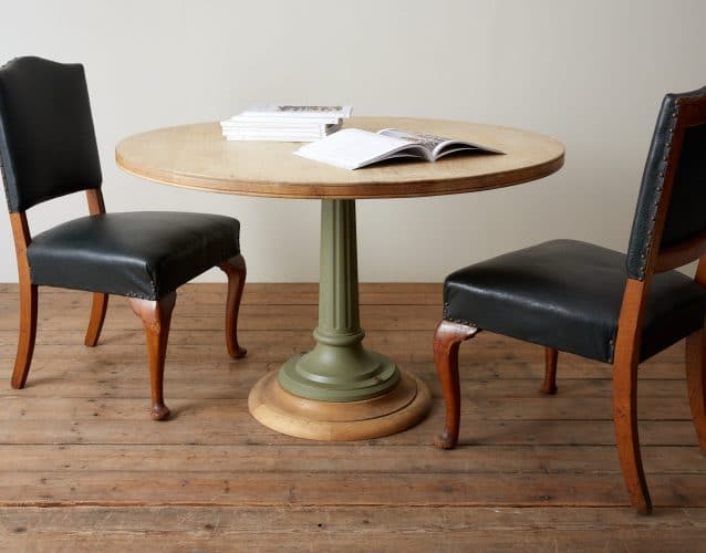 A handmade HOWE Brunel Table with an English oak top and an iron stem cast by hand in Birmingham.