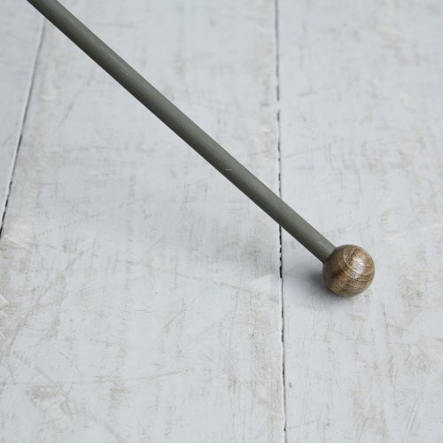Our Howe Home Pylon Floor Lamp has a modern design with little wooden ball feet, and is made by hand in England from tubular steel.