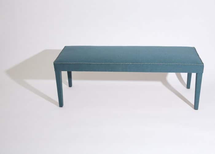 Howe Silhouette Bench, covered in ‘Diesel’ Ripstop canvas from Howe at 36 Bourne Street, finished with a hand stitched border