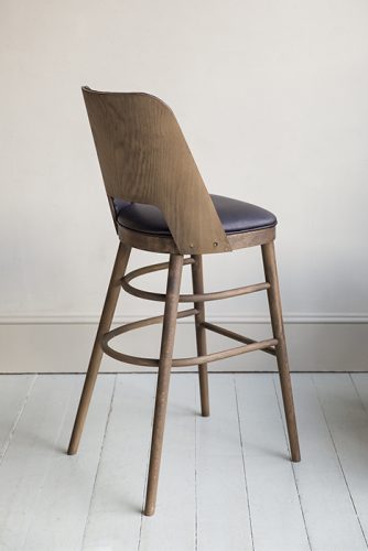 A handmade Camembert Bar Stool, traditionally made in England by HOWE London.