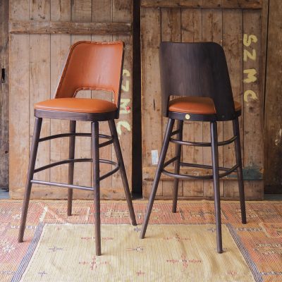 A handmade Camembert Bar Stool, traditionally made in England by HOWE London.
