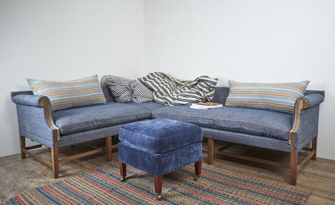A corner Greyhound Sofa, traditionally made by hand in the UK by HOWE London