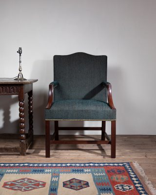A handmade HOWE London Gainsborough Carver Armchair traditionally made in England.