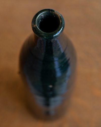 HL6795 Two Early C20th Tin Glazed Terracotta Bottles686